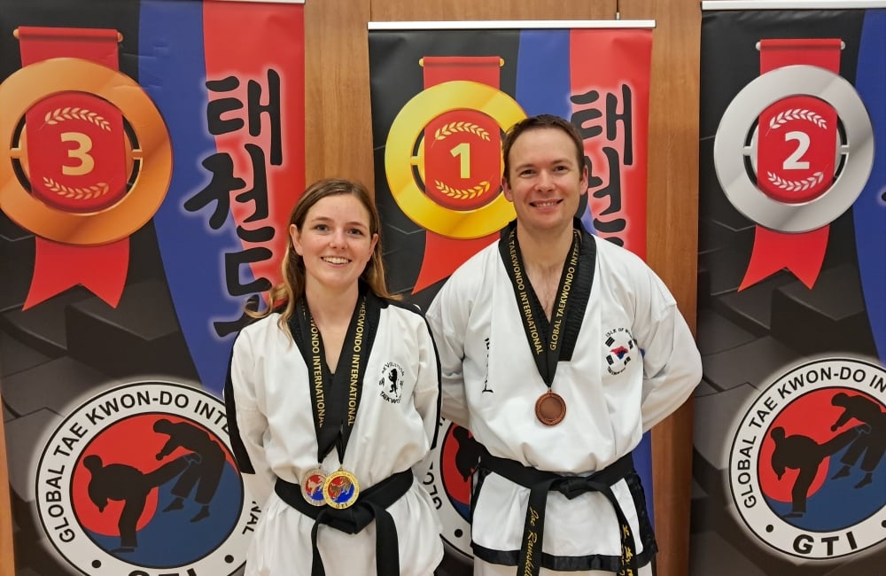 Joe with team mate and their medals