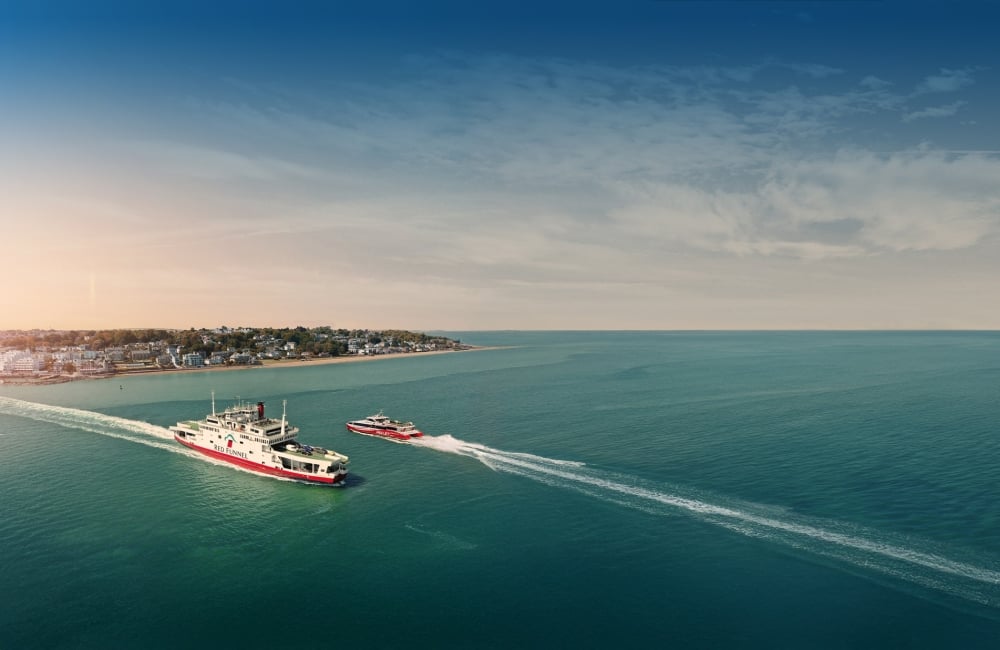 ferry and red jet crossing each other in the solent
