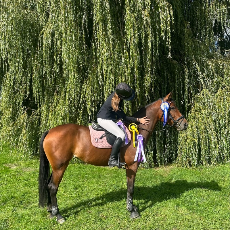 Rubi Harper with her rosettes 