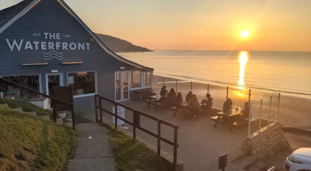 external shot of the waterfront, totland bay, during sunset