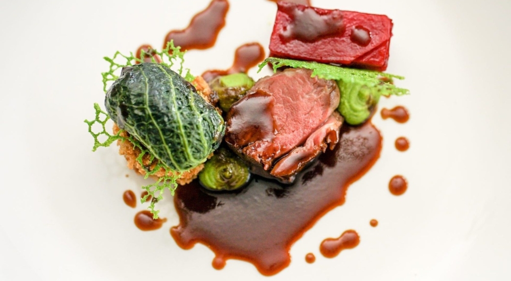 neatly plated lamb dish