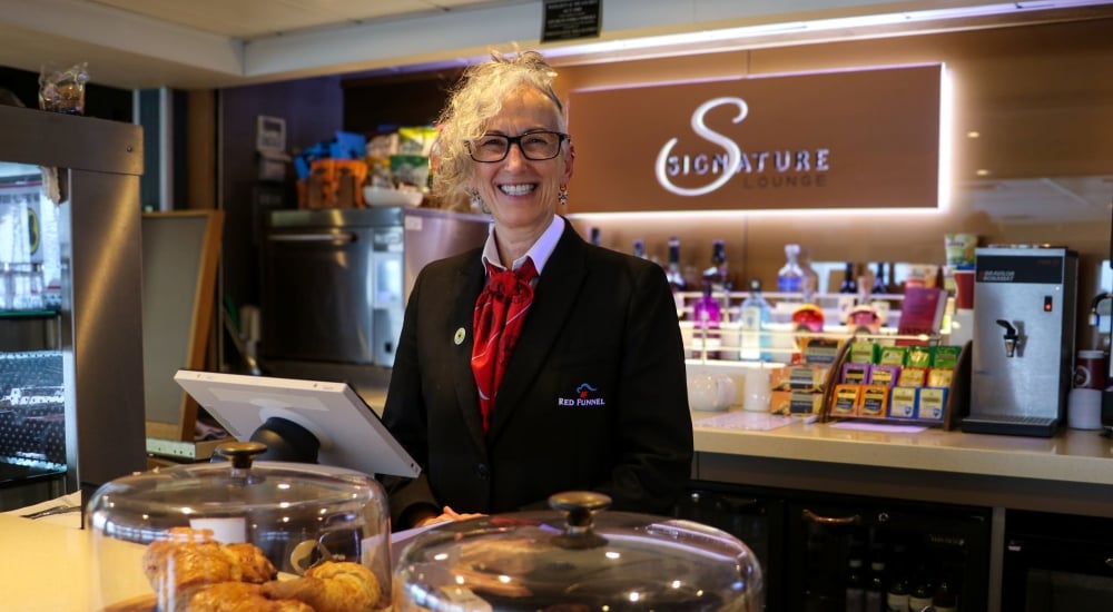 smiling signature-lounge assistant